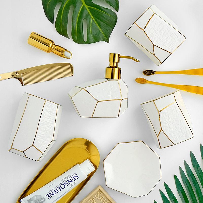 

Nordic Luxurious Bathroom Accessories Set Golden and White Sketch Geometrics Bone China Gift Set Porcelain With Organizing Tray
