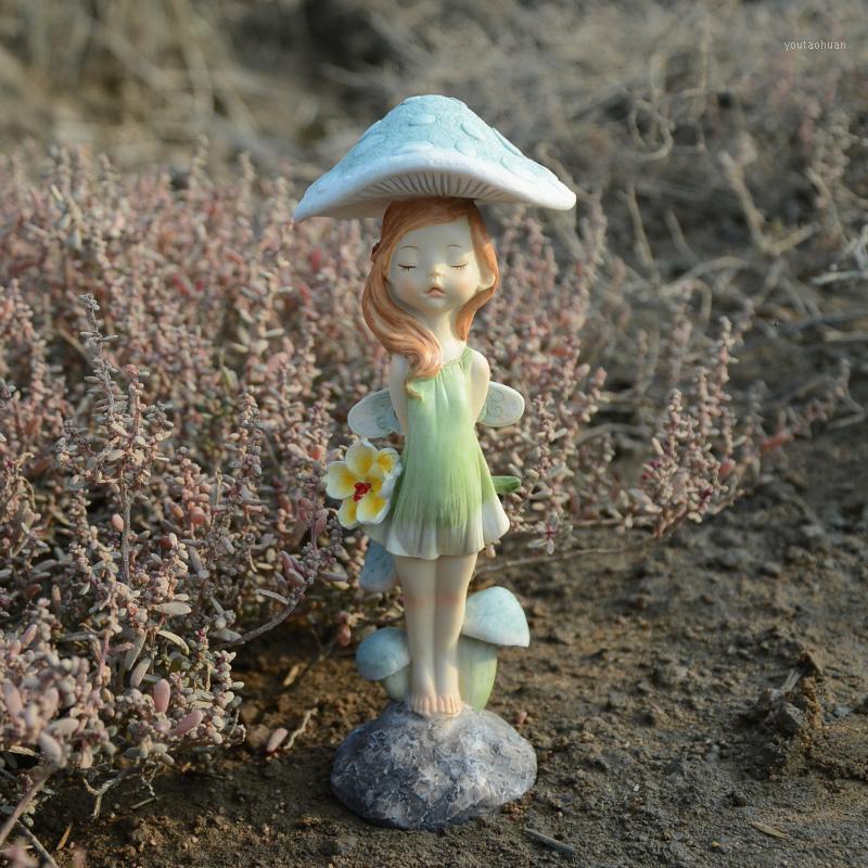 

Creative cute mushroom elf flower fairy girl resin home decoration ornaments to send girls Festival gift fairy garden decoration1