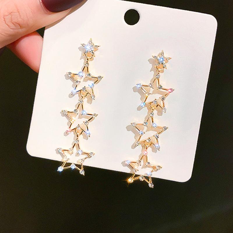 

Fashion Crystal Star Drop Earrings Shiny Imitation Rhinestone Earrings for Women 2021 Trend Korean Hollow Out Star Dangler Gifts