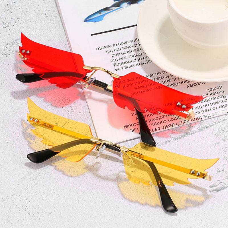 

Sunglasses 2021 Trendy Wing Women Punk Glasses Men Rimless Cat Eye Sun Small Cool Shades UV400