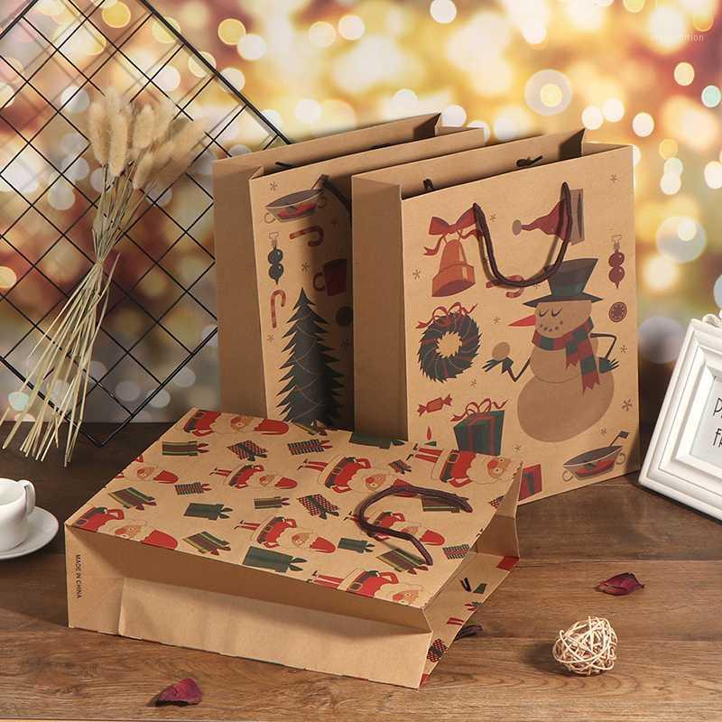 

1pcs Christmas Gift Bags Xmas Packing Bag Candy Box Paper Handbag With Handle Kraft1