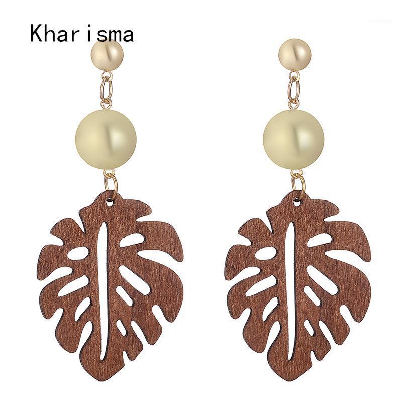 

KHARISMA Trendy Golden Beads Pom Pom Long Stud Earrings 2020 Ethnic Brown Hollow Natural Wooden Leaf Pattern Big Stud Earrings1