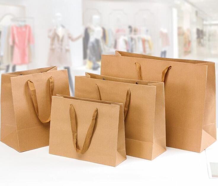 

Craft Paper Gift Bag with Handle Wedding Party Bag Christmas Portable Packing Shopping Bags New Year Friends Gift Bags1