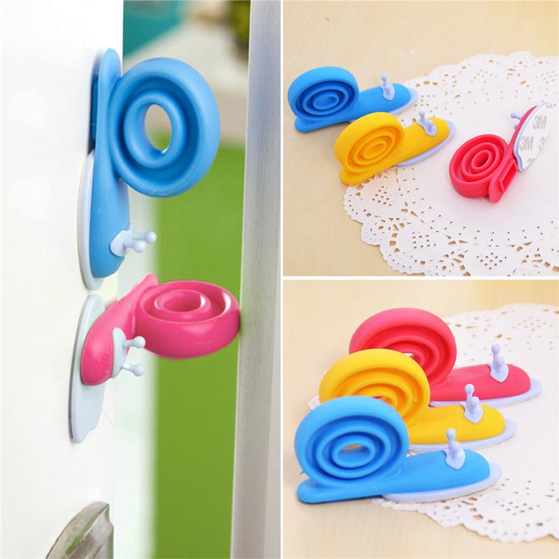 

3Pcs/lot Soft Plastic Baby Home Safety Door Stopper Protector Children Safe Snail Shape Door Stops Baby Gate Corner Protector