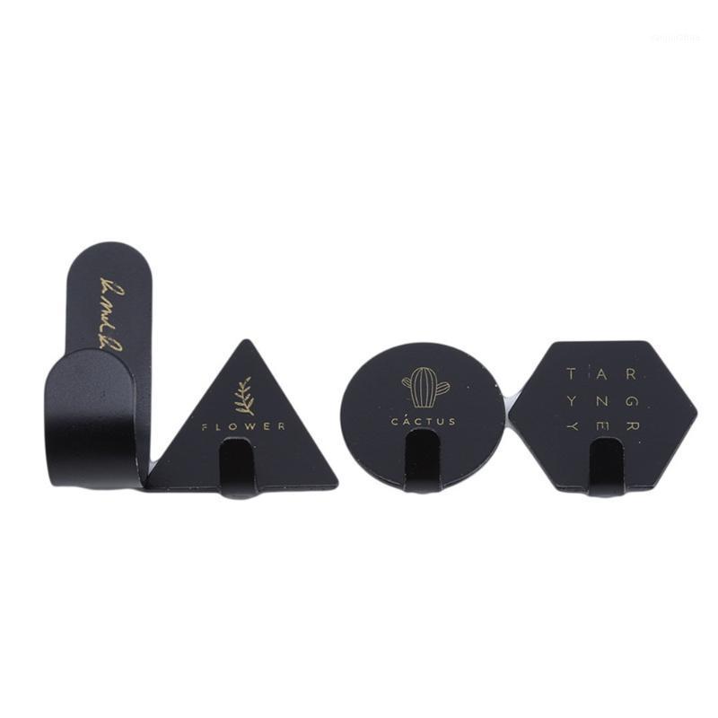 

4pcs Geometric Shape Hook Printing Wrought Iron Viscose Hook Wall Mounted Storage Saves Space Wall Hanging Tool1