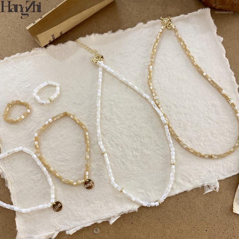 

HangZhi 2020 New Korean Vintage Translucent Geometric Milky Opals Stones Gold LOVE Letter Pendant Beading Bracelets for Women1