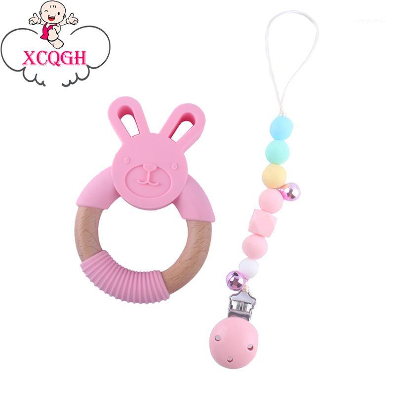 

XCQGH 2Pcs/set Silicone Beech Wooden Teething and Teether Pacifier Chain Clip for Holder Boy Girl1