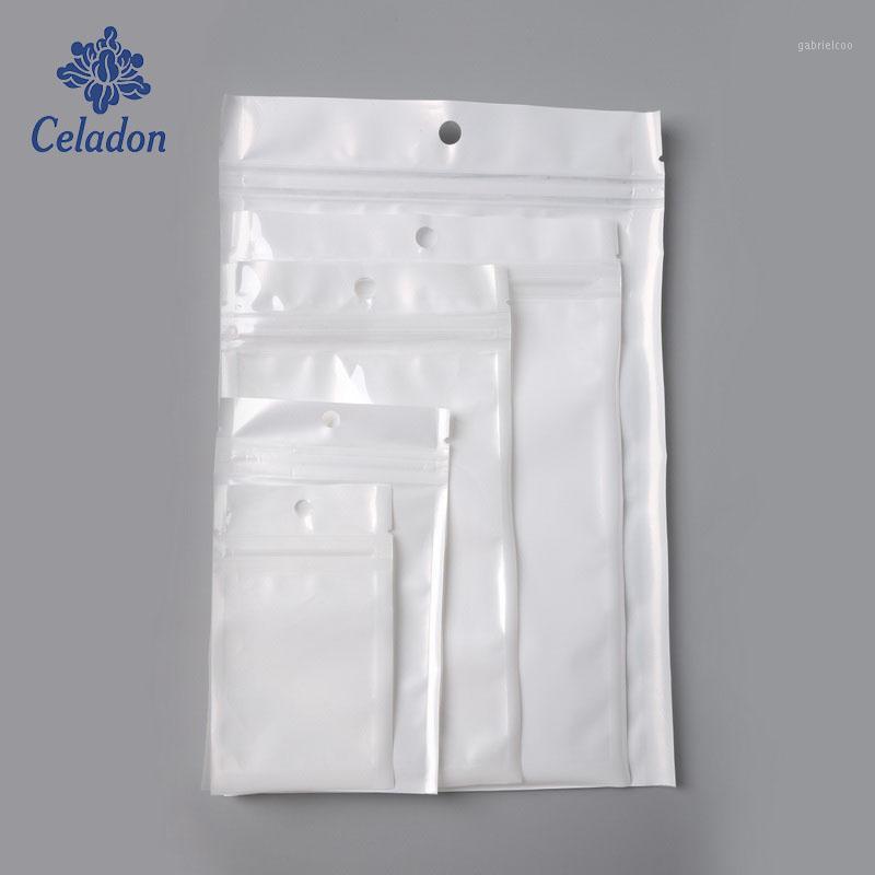 

New Arrival Multi Sizes White / Clear Self Seal Zipper Plastic Hang Hole Retail Packaging Packing Poly Bag Package1