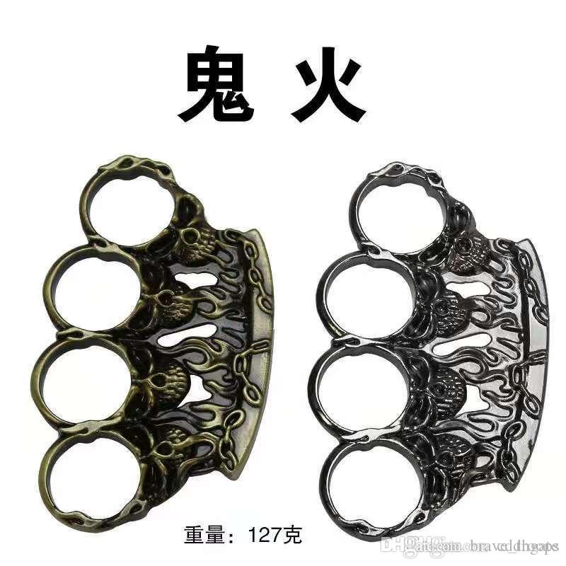 

Defense tool hand Metal Skull buckle iron buckle four finger gloves tiger ring self defense support children pistol boxing