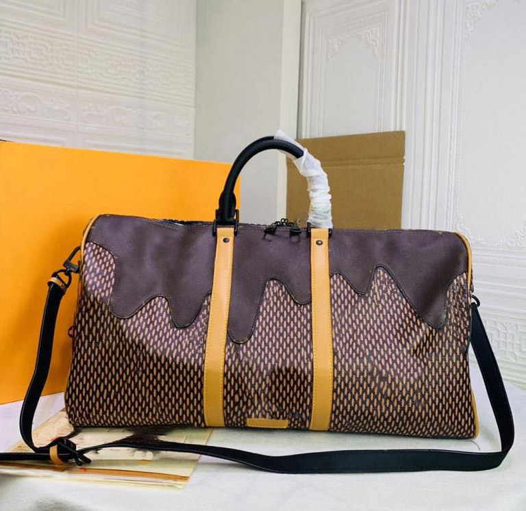 

Designer fashion high quality luxury travel bag for men and women large capacity leather outdoor portable shoulder hand size 50-29-23 cm