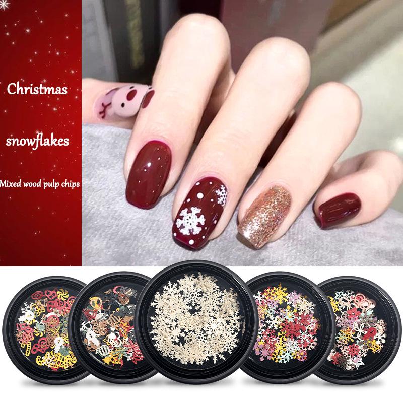 

1 box of Christmas nail art decorations Christmas tree snowflake wood pulp pieces 100pcs nail DIY accessories