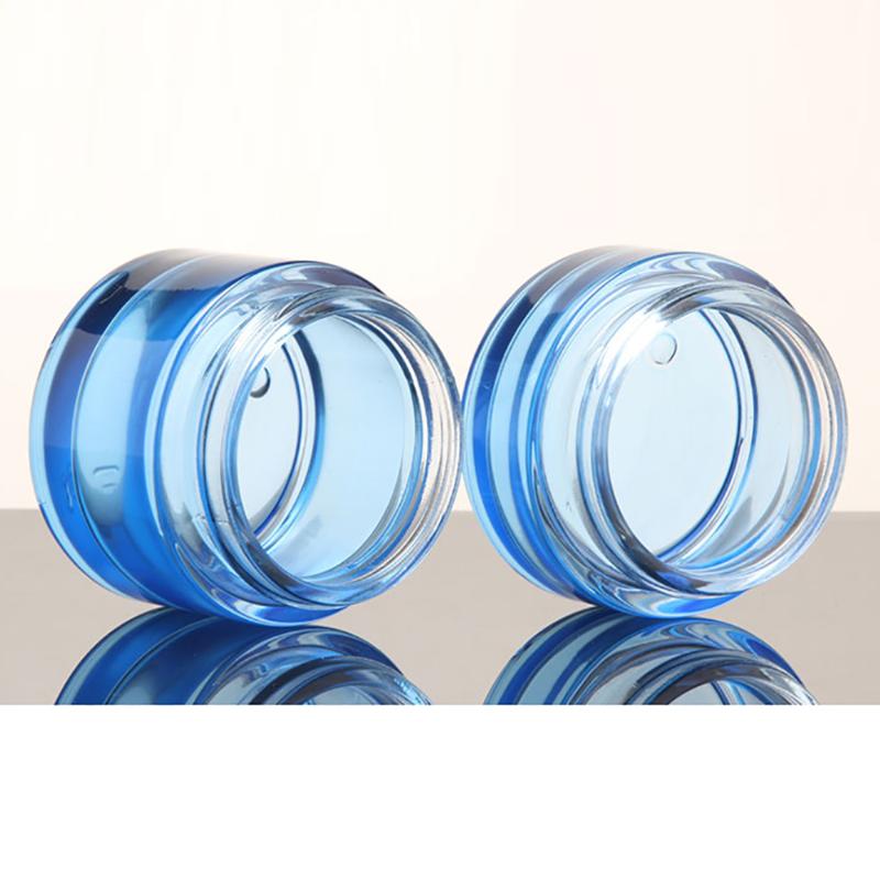 

China manufacture blue 50g glass cream jar with silver and golden lid, empty 50g makeup face cream bottle