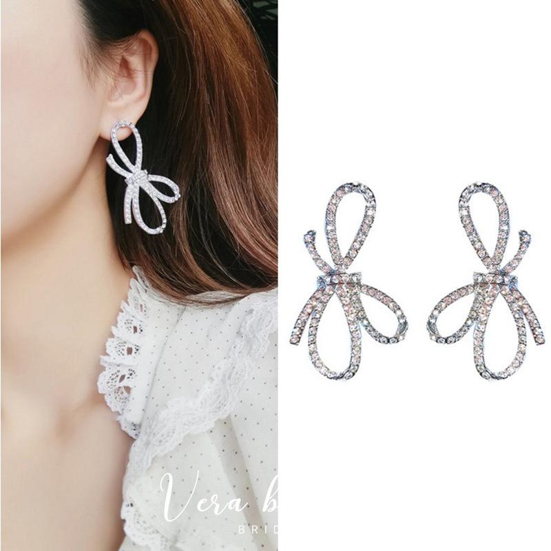 

Stud Tremble Earpin Super Twinkle Drill Bow Female European And American Temperament Exaggerated Earrings Long Top 100 Earring