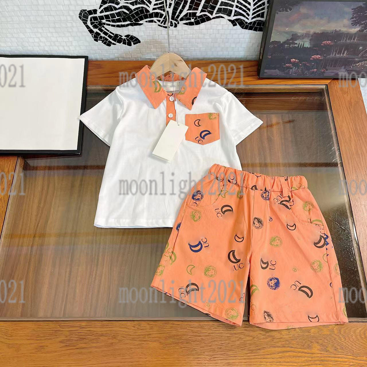 

22ss summer boys orange polo t shirts+shorts sets casual sports suits cotton tracksuits short sleeve color childrens suit brand clothing cotton tees size -150, 01