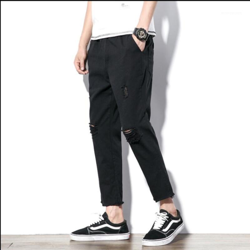

5xl Summer New Hole Pants Men's Casual Feet Pants Jeans Loose Hairstylist Nightclub Tide Black Harem Plus Size Costumes1