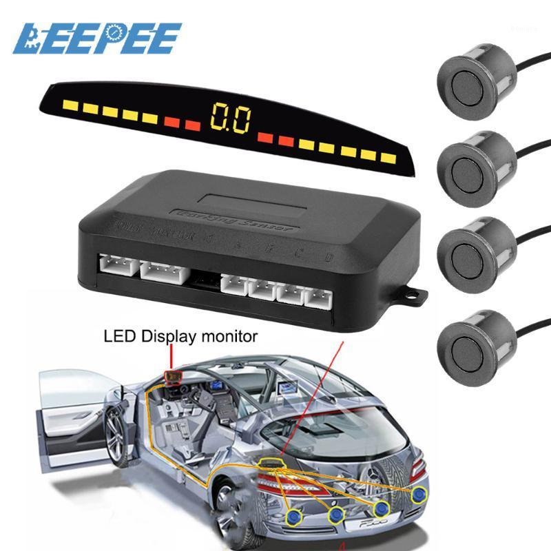 

LEEPEE Universal Car LED Parking Sensor Auto Car Detector Parktronic Reverse Backup Radar Monitor System With 4 Sensors1