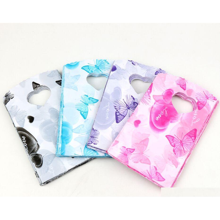 

2017 New 200Pcs/Lot 4Colors 15X9Cm Heart And Butterfly Patterns Plastic Jewelry Gift Bag Jewelry Pouches Bags 9Lszn