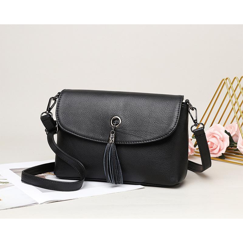 

New cowhide women's bag fashion large capacity single shoulder tassel bag, Black