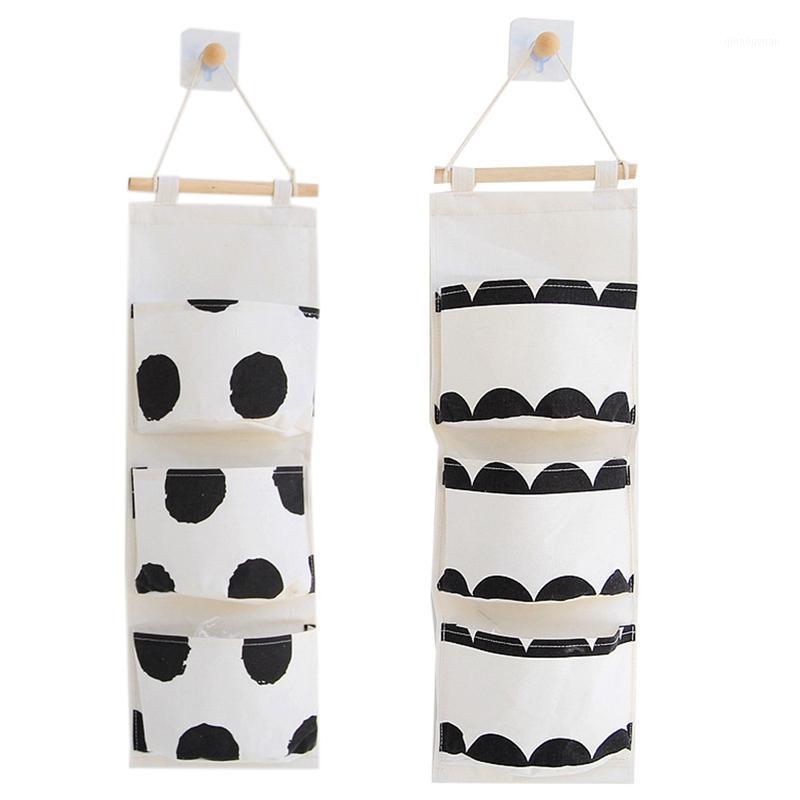 

Black and White Three Pocket Hanging Bag Wall Polyester Cotton Hanging Storage Bag1