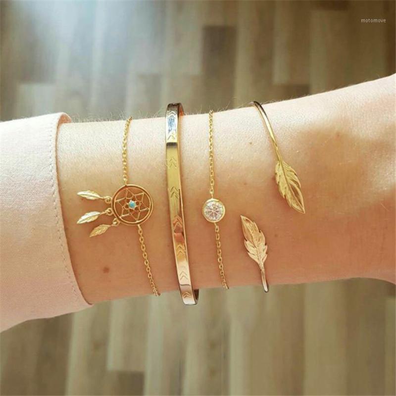 

Free Shipping 4pcs/set Crystal Arrow Leaf Cuff Bangles For Women Dreamcatcher Tassel Charm Bangle1