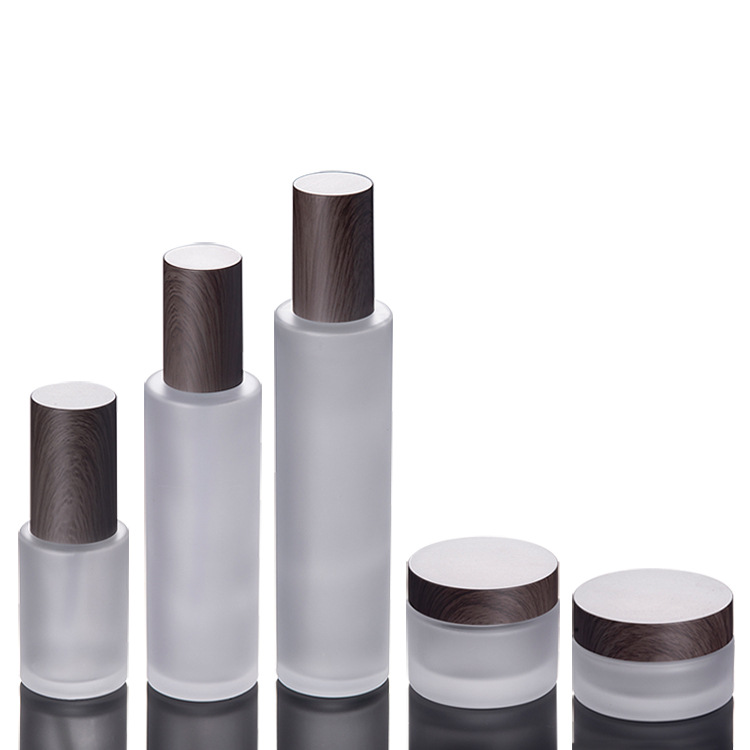 

Frosted glass cosmetic jars pump bottles with plastic woodgrain cap 30g 50g 30ml 100ml 120ml body lotion lip balm cream containers