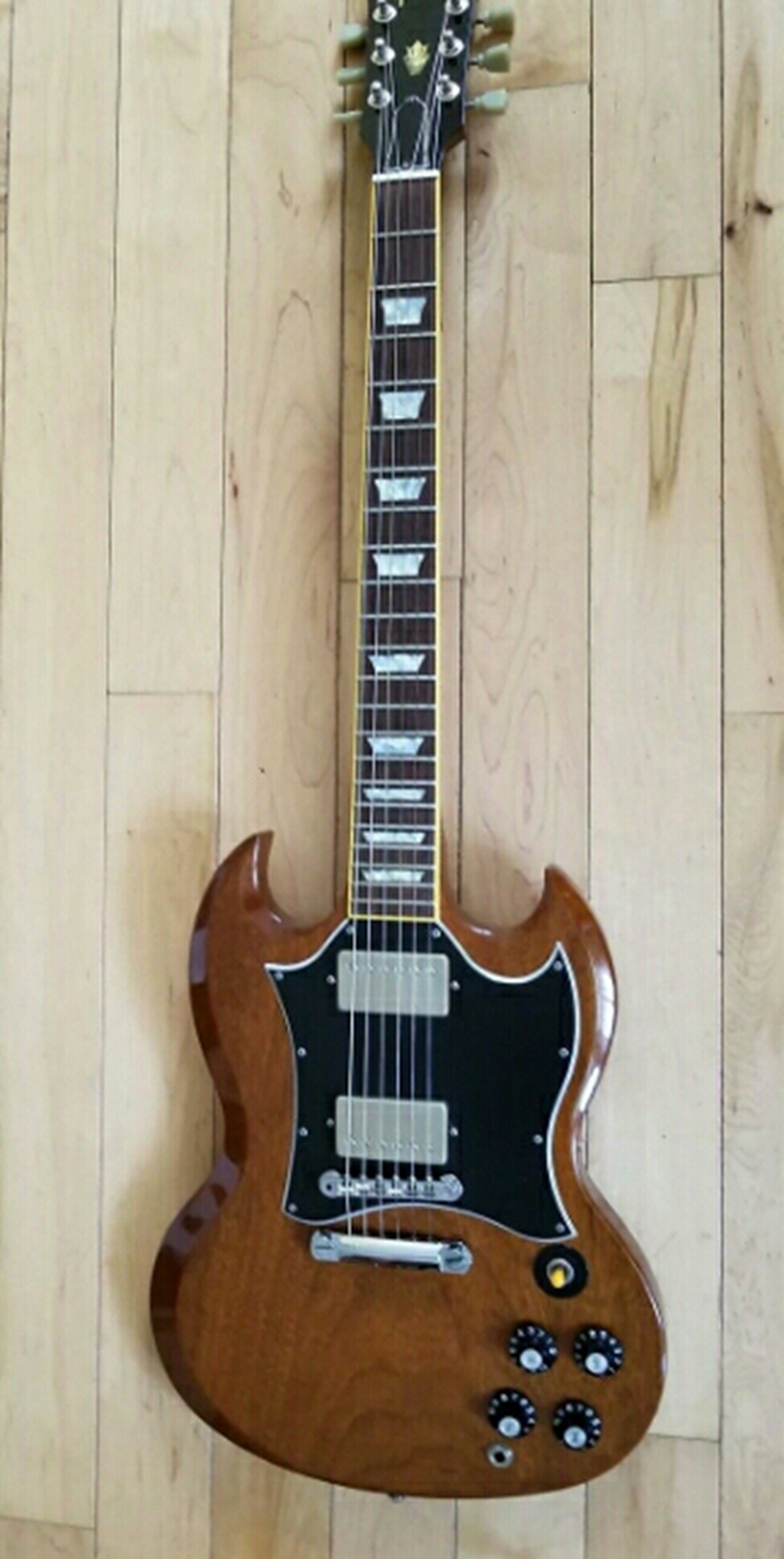 

Custom Shop Satin Walnut Brown SG Electric Guitar Rosewood Fingerboard, Pearl Trapezoid inlay, Chrome Hardware, Tuilp Tuners