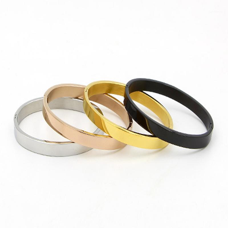 

Hot Sell Classic Beautiful And Elegant Hollow Roman Numeral Bracelets & Bangles Stainless Steel Bangle For Woman1