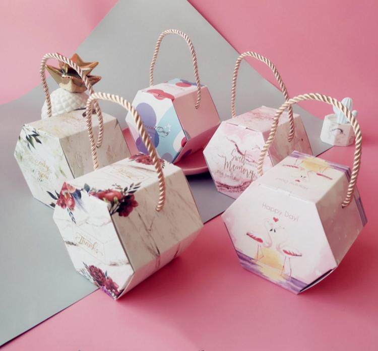 

Hexagonal boxes, ropes, party gifts, cardboard boxes, wedding candy shelves, birthday party display decorations
