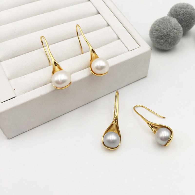 

jewelry in Europe and the contracted fashion personality of French freshwater pearl earrings eardrop joker FA - E31