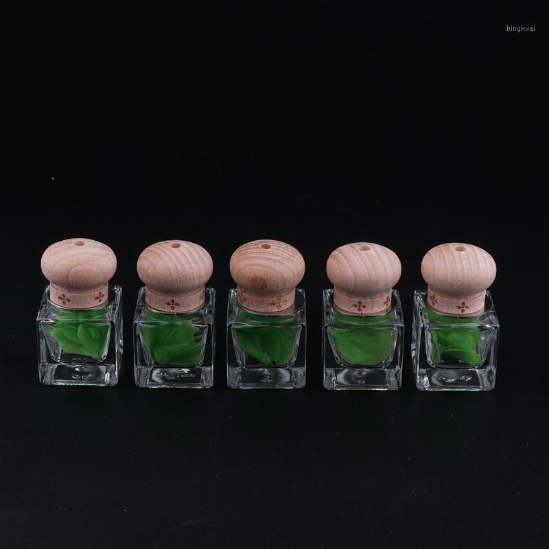 

5 Pieces Refillable Air Fragrance Container Perfume Glass Bottle with Wooden Cover for Car Bathroom Decoration1