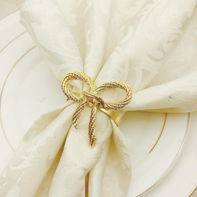 

10pcs/lot Hotel Western Restaurant Golden Bow Tie Napkin Ring Napkin Button Cloth Ring Metal1