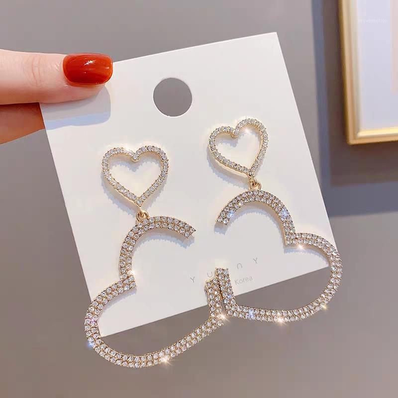 

Exaggerated fashion crystal double heart earrings contracted joker long Women Dangle Earrings Hollow Crystal Heart1