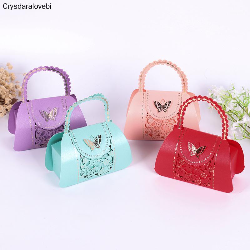 

New Creative Wedding Candy Box Hollow Portable Gift Boxes Bag with Handles Romantic Wedding Party Supplies Christmas Favor Box1