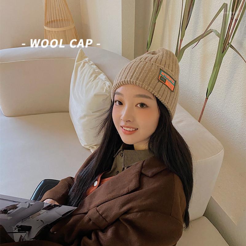 

Autumn and Winter Warm Ear Protection Woolen Hat Japanese All-Match Candy Color High-Density Patch Knitted Hat Women1