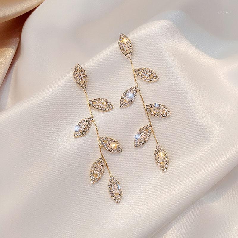 

Luxury Gold Color Crystal Leaves Dangle Earring Delicate Cubic Zircon CZ Stud Earrings Wedding Jewelry Pendant1