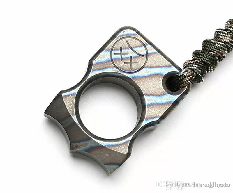 

Dikol multi functional titanium alloy tiger finger legal self defense small weapon concealed weapon student finger buckle defense finger 001