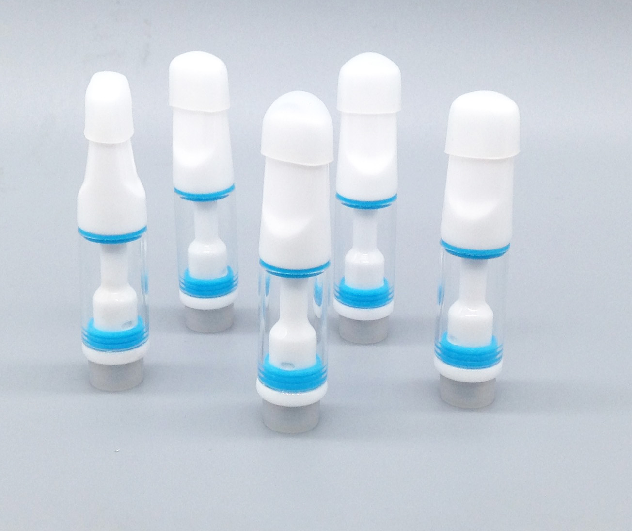 

New Design ceramic Vape Atomizer full ceramic vaporizer Ceramic Coil Oil Cartridge compatible all 510 battery Press Glass Tank 0.5ml 1ml