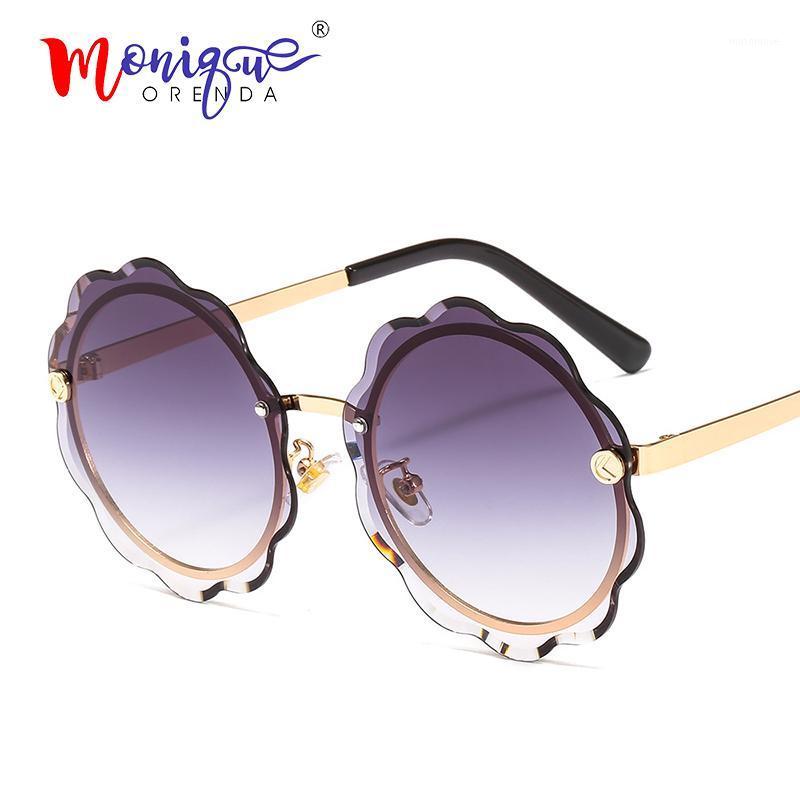 

Luxury rimless sunglasses women vintage brand designer flower edge wave sun glasses men female shade UV4001