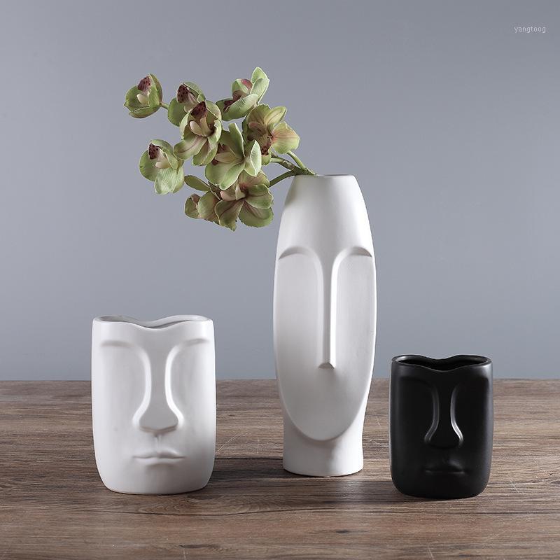 

Nordic Minimalist Ceramic Abstract Vase Black and White Human Face Creative Display Room Decorative Figue Head Shape Vase1