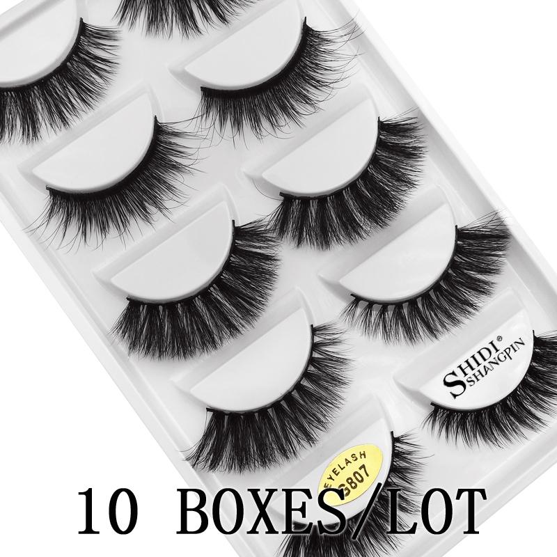 

Sexy 50 pairs wholesale natural long false eyelashes messy 3d mink lashes make up hand made soft fluffy fake lash extension G807