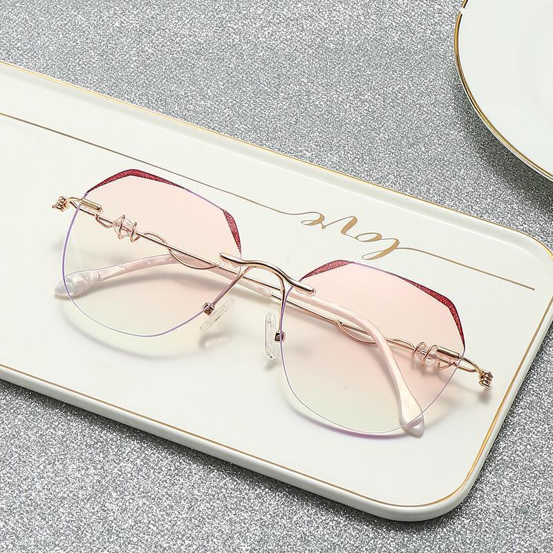 

Retro Anti Blue Light Glasses Frame Metal Round Crystal Rimless Sunglasses Luxury Eyewear for Women1