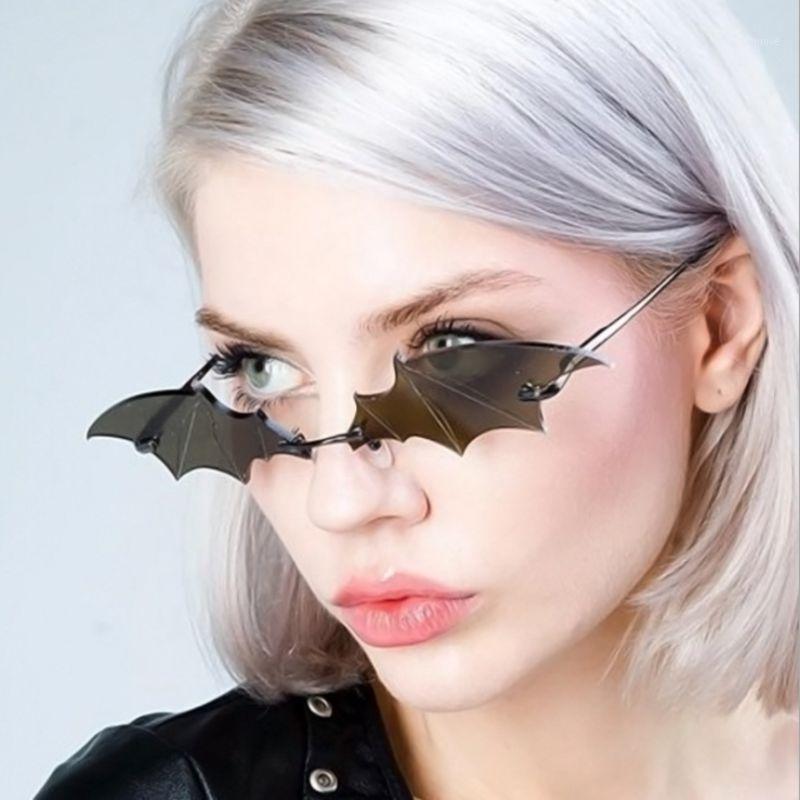 

New Bat Sunglasses personality metal Women Men Fashion Rimless Flame Sun Glass Dazzling Mirror Luxury Cat Eye Eyewear UV4001