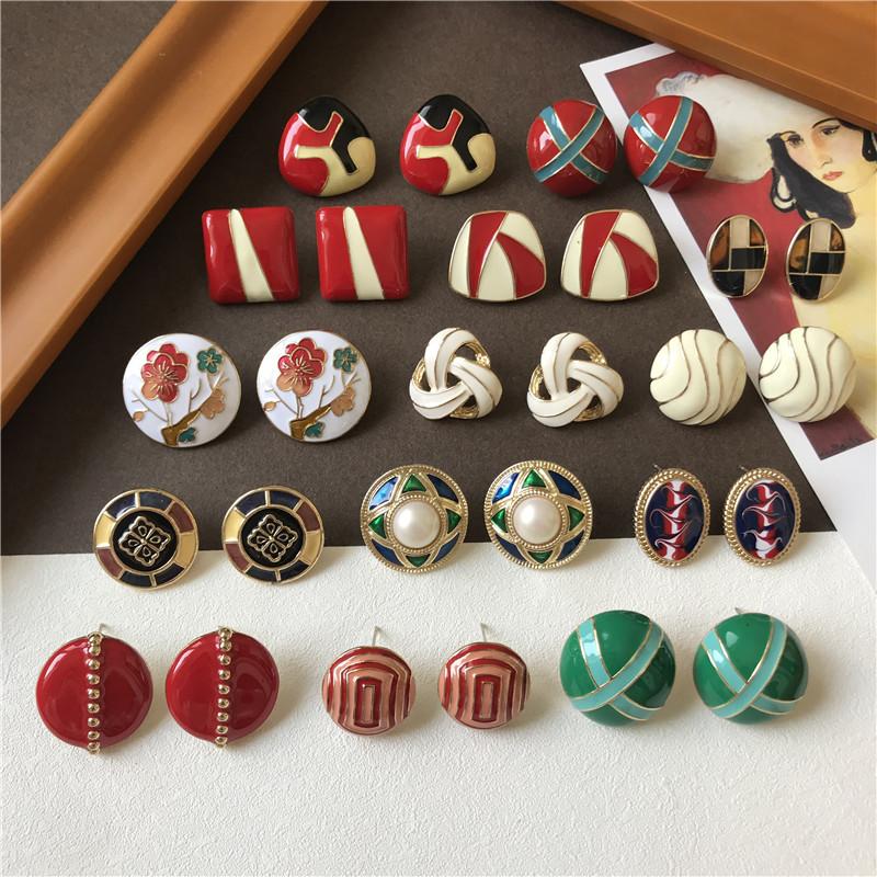 

HUANZHI 2020 New Retro Elegant Splicing Mysterious Pattern Dripping oil Contrast Irregular Cross Line Earring for Women Jewelry
