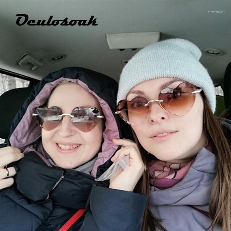 

Parent-child new fashion love sunglasses women and men cut edge frameless sunglasses peach heart shape UV4001