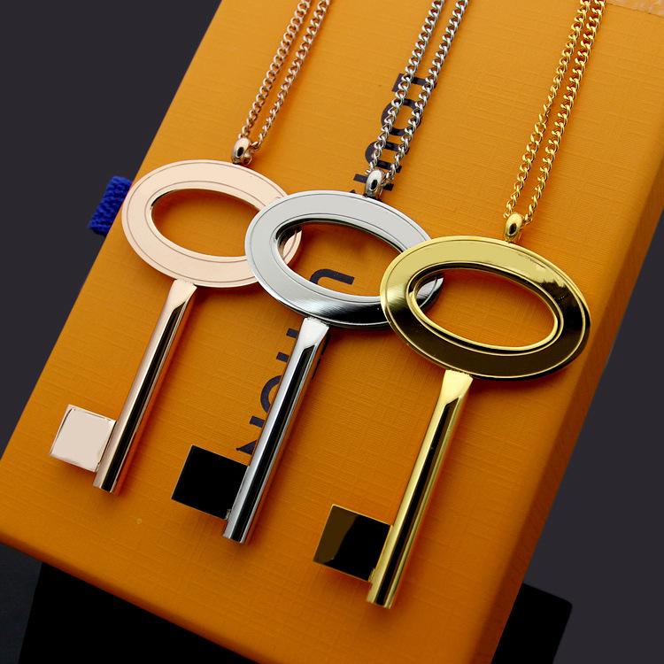 

Wholesale Titanium steel v-key long necklace, foreign trade big key sweater chain