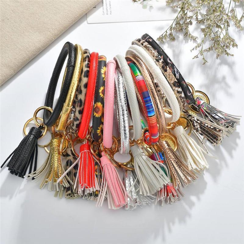 

Enamel PU Leather O Keychain For Women Girls Fashion Multiful Tassel Key Chain Round Bag Car Pendant Wristlet Keyring Gifts1