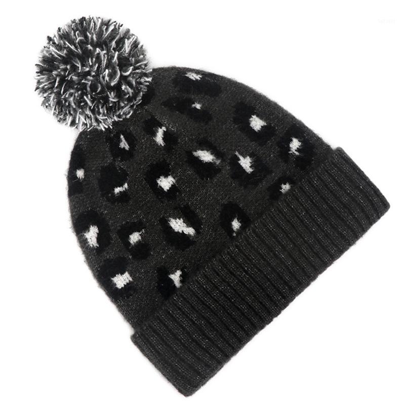 

Women Winter Warm Knitted Cuffed Beanie Hat Vintage Leopard Pompom Skull Cap1