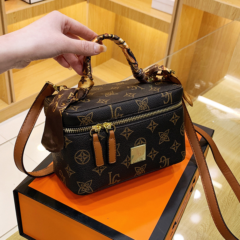 

Wholesale factory ladies shoulder bag street trend square cosmetic case handbag sweet ribbon decorated woman handbags elegant atmosphere printed backpack, Brown 6613