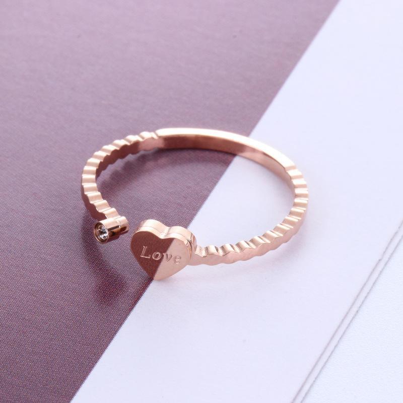 

Nice Gift Rose Gold color Titanium Steel Simple Heart Woman Rings with Rhinestones ,Openning ring for girl ,Size 5-10 availabe1