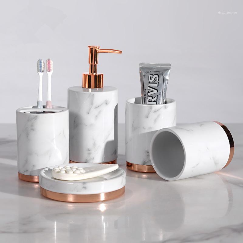 

Bathroom Accessories Set Ceramic Metal Base Soap Dispensers Toothbrush Holder Gargle Cups Soap Dish With Tray Set Wedding Gifts1